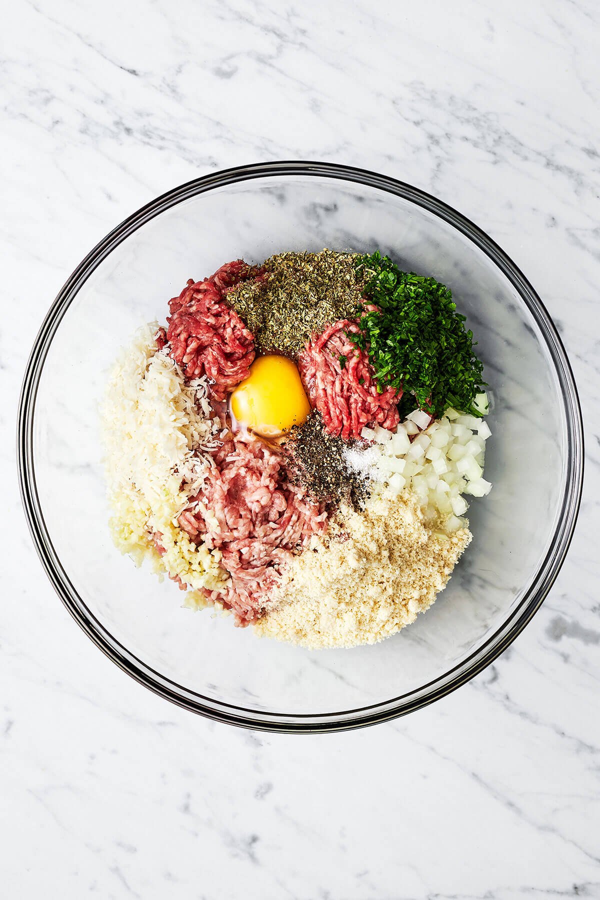 Ingredients for meatballs in a bowl